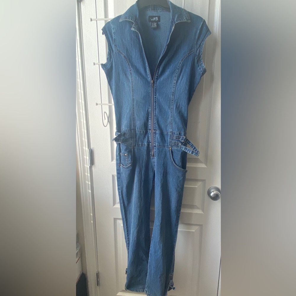 Lips sleeveless denim jumpsuit with buckles.